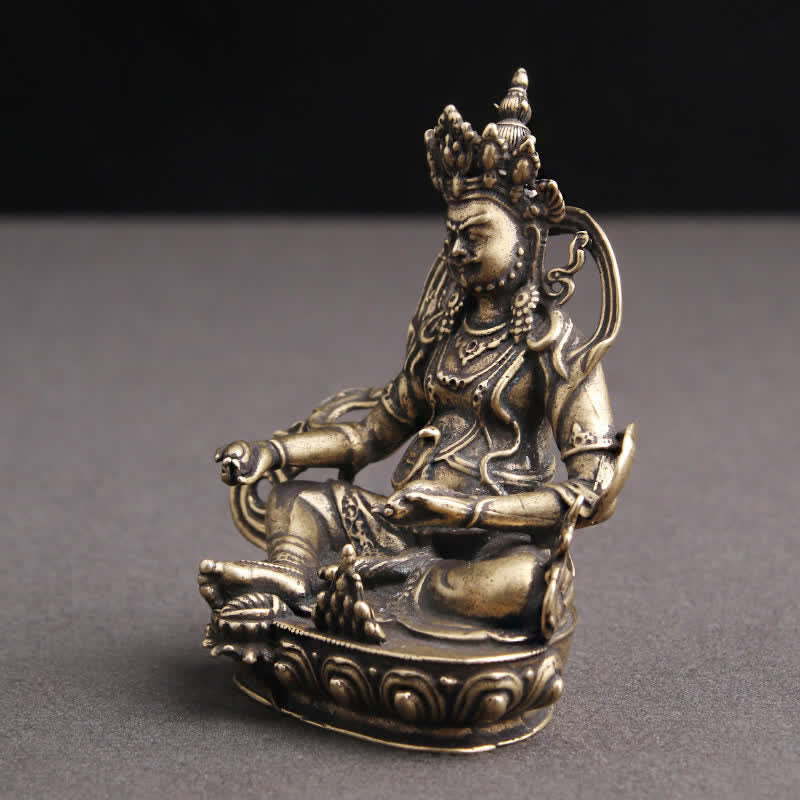 Yellow Jambhala Copper Buddha Statue – macro of color transition, handcrafted ten hue design
