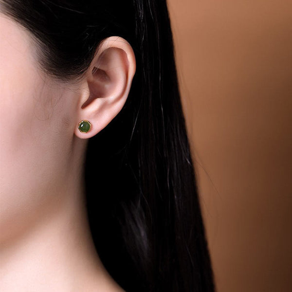 Hetian Cyan Jade Gold Plated Silver Stud Earrings model wearing left ear