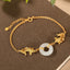 White Jade Koi Bracelet – full bracelet laid flat showing all white jade koi fish beads on elastic cord
