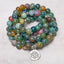 108 Mala Indian Agate Bracelet – coiled agate beads with silver Lotus charm on light surface, meditation prayer beads