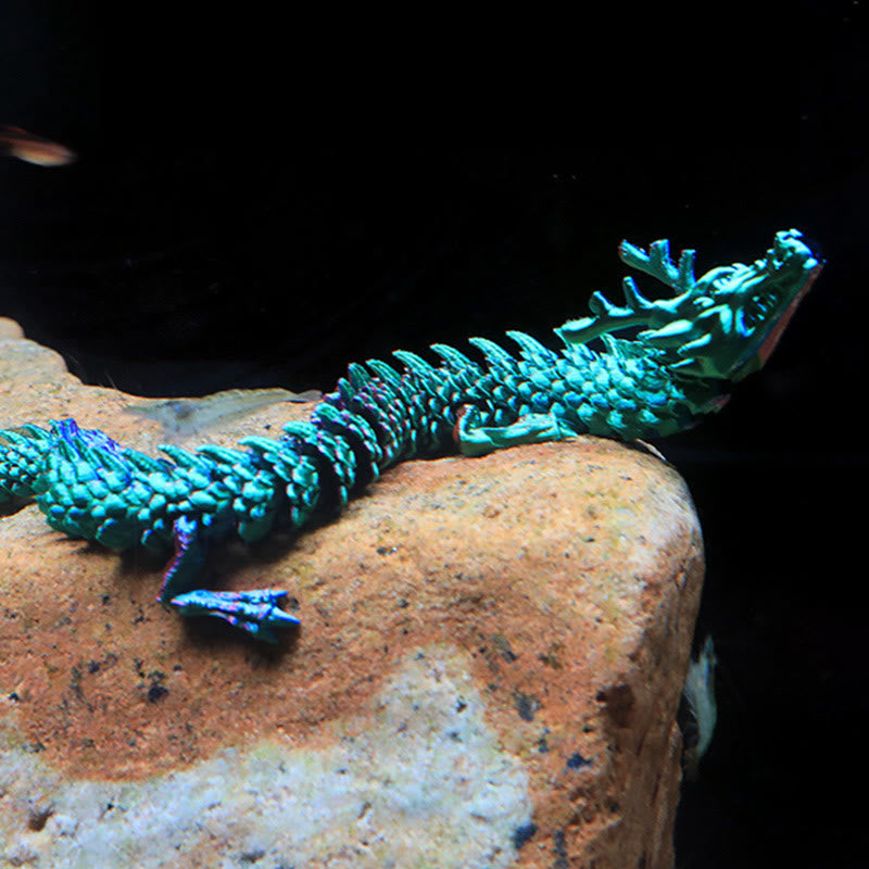 Feng Shui 3D Dragon - Teal and purple chameleon dragon perched on weathered rock, luminous luck charm