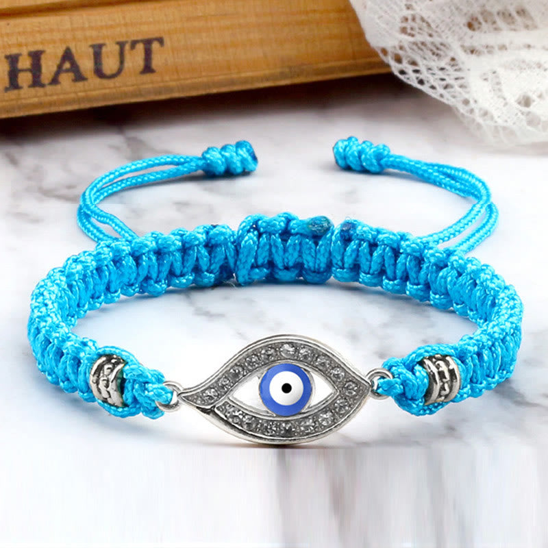 Turquoise cord evil eye bracelet with silver crystal evil eye charm, marble styling