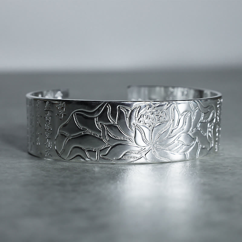 Tibetan Lotus White Copper Luck Bracelet - Silver cuff lotus engraving with Chinese characters low angle, Cultural heritage