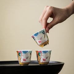 Dragon Phoenix Ceramic Teacup - Three hand-painted cups on black tray with floral and bird motifs, Artisan tea