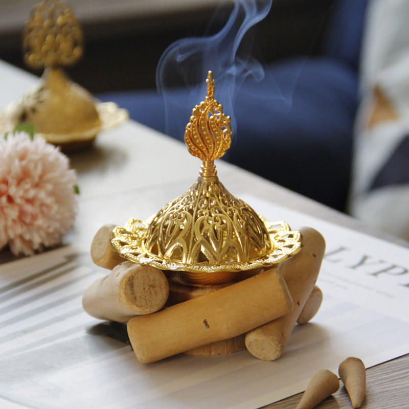 Gold Alloy Mini Incense Burner – filigree lid on natural wood base with burning cones and smoke, bakhoor incense burner