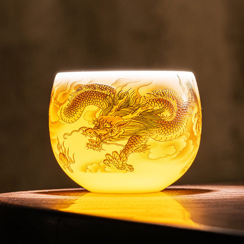 Dragon Phoenix Clouds Ceramic Teacup Gift Set – Backlit golden dragon through translucent porcelain, dark moody glow