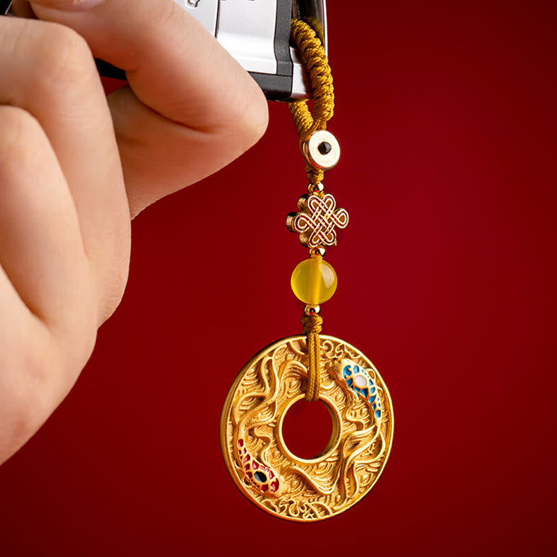 Double Koi Key Chain - held in hand showing actual size and weight, feng shui gift