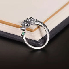 Vintage Dragon Design Ring - Silver dragon wrap ring with green gem accent on vintage book, Success