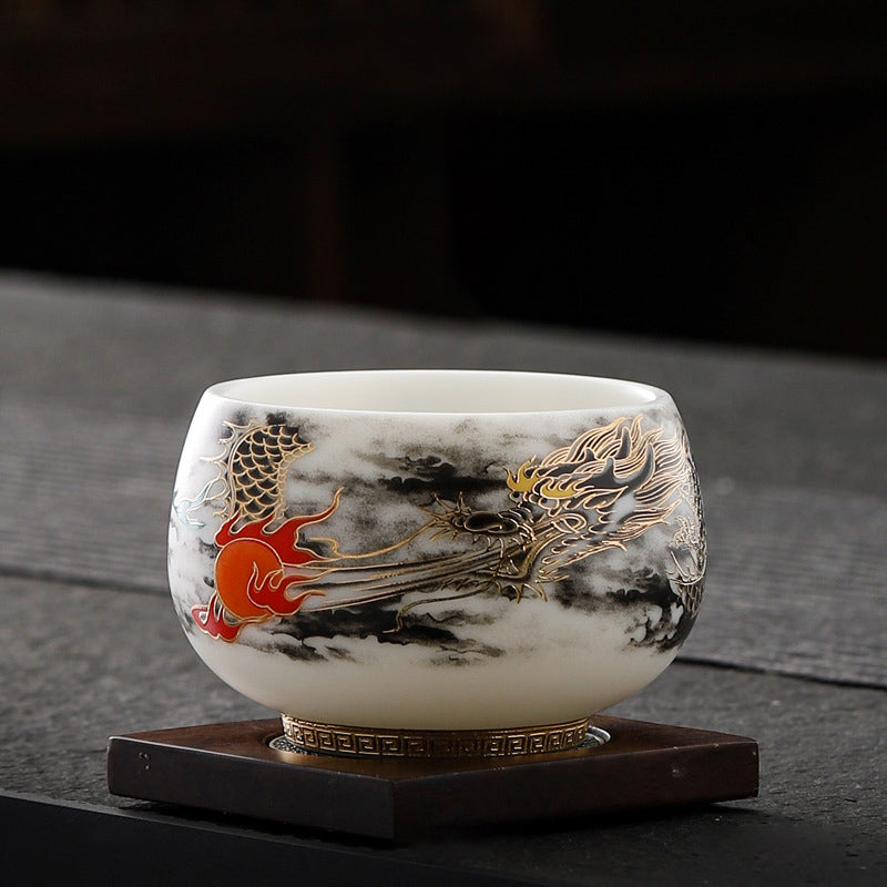 Dragon Playing Pearl Porcelain Teacup – Gold dragon with red pearl on hexagonal stand, dark moody collectible display