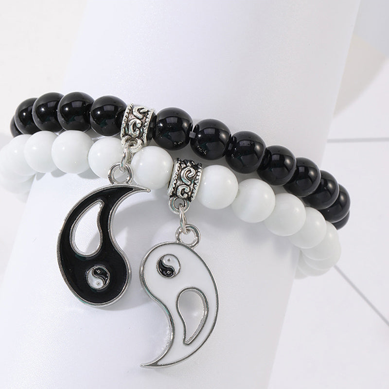 Yin Yang Protection Couple Bracelet - Matching couple bead bracelets on display stand, black white yin-yang protection jew...