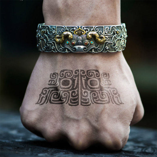PiXiu Engraved Blessing Bracelet Bangle – silver-plated copper cuff with gold horns and gems on wrist, tattoo art
