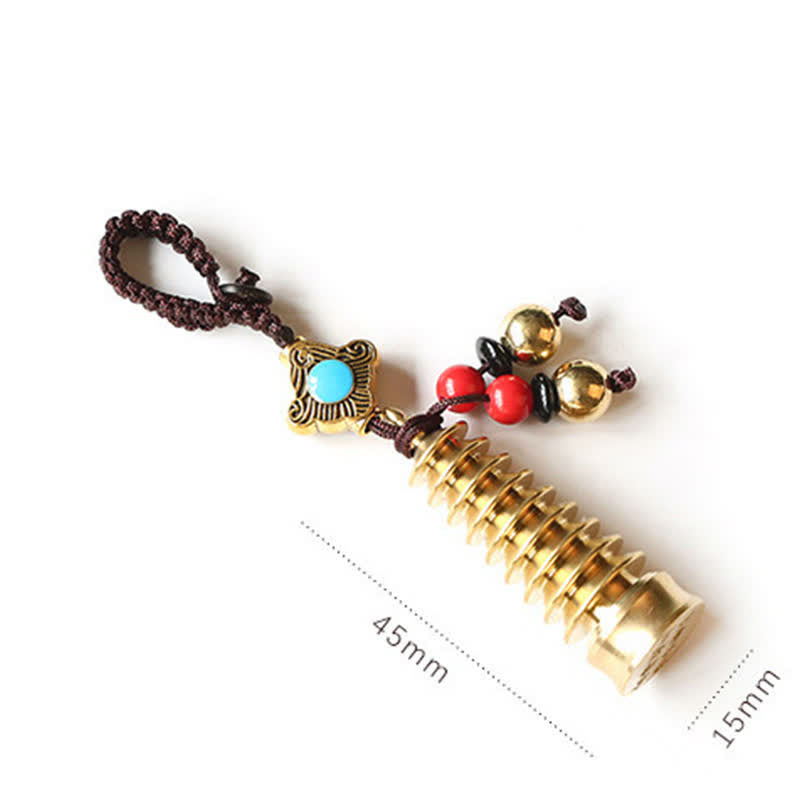 Feng Shui Yin Yang Bagua Keychain - Multi-tiered golden pagoda charm with turquoise stone, brass keychain