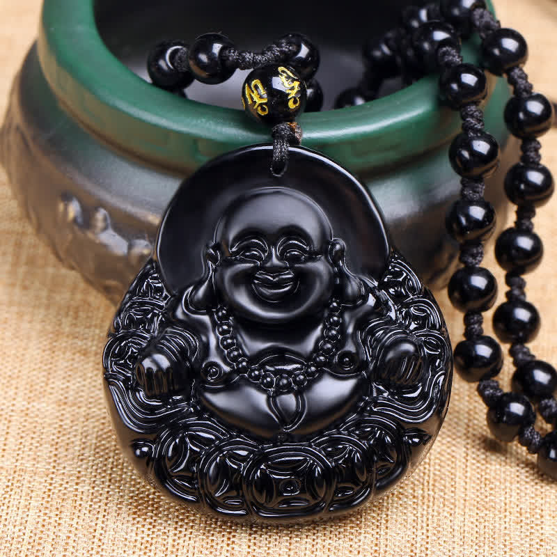 Black Obsidian Laughing Buddha Pendant Necklace – obsidian Laughing Buddha closeup, green ceramic – closeup, strength