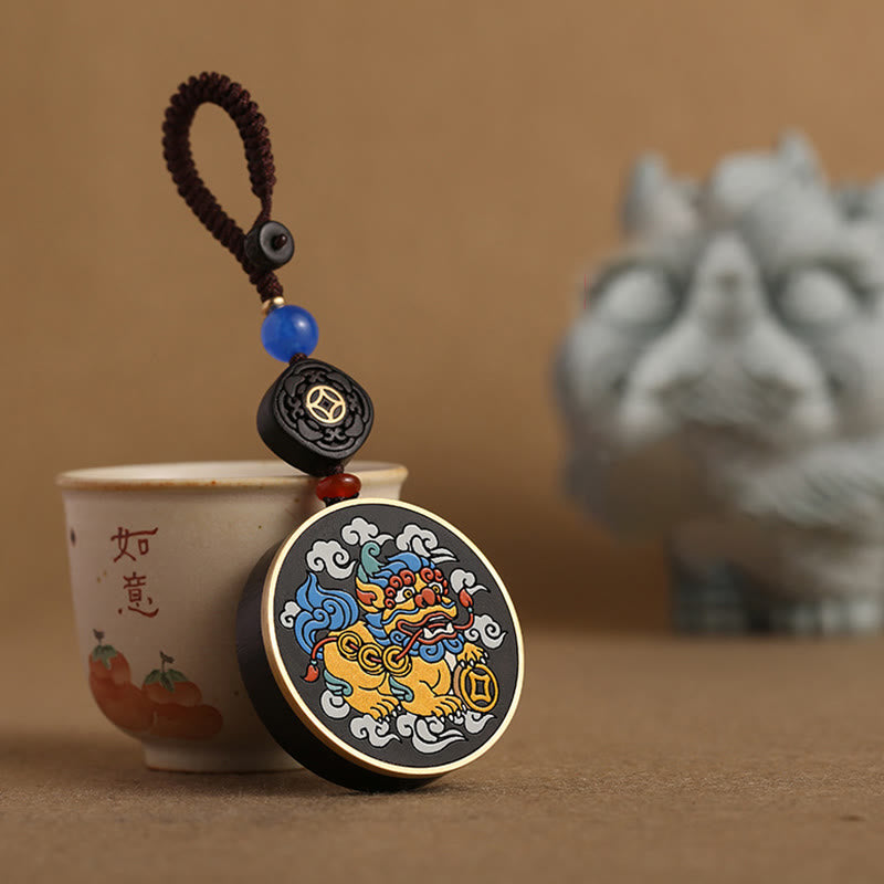 PiXiu Coin Keychain – Resting against Ruyi teacup with gray PiXiu figure behind
