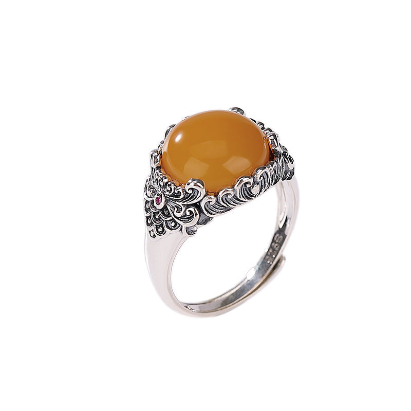 Vintage Silver Honey Amber Ring – Ornate silver amber ring isolated on white background, adjustable ring