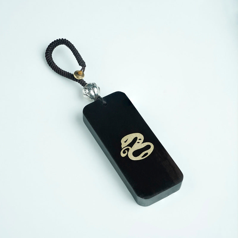 Ebony Big Dipper zodiac keychain with silver inlay Dragon symbol and celestial script