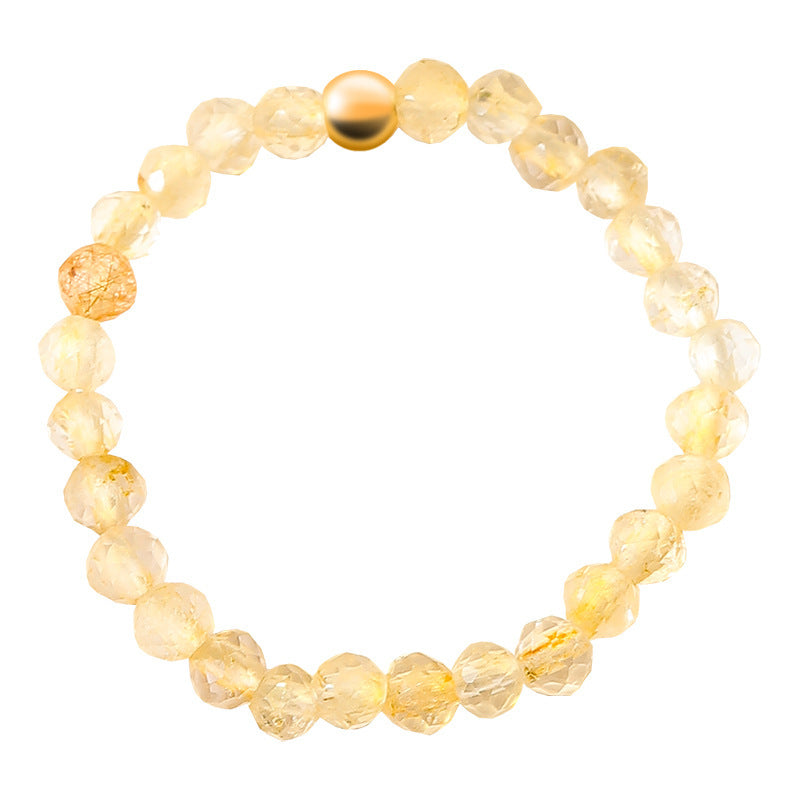 2mm Citrine Ring – Close-up of tiny citrine bead ring on pure white, gold accent feng shui wealth ring