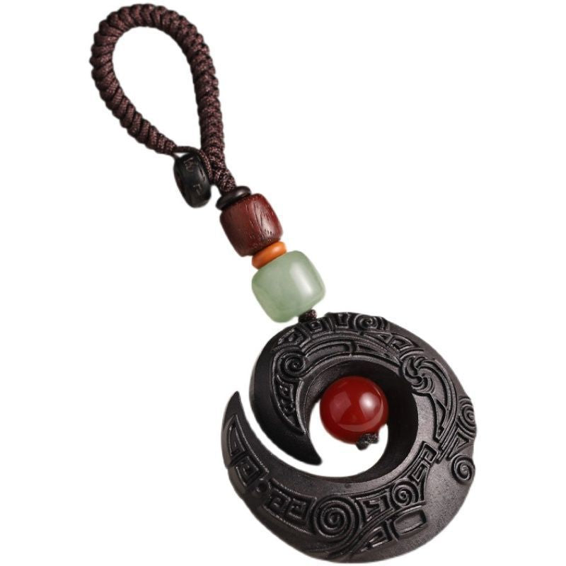 Feng Shui ebony wood protection keychain size chart showing 38x39mm pendant and 9cm total length
