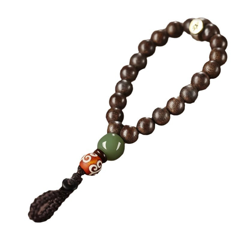Hetian Jade & Agarwood Zodiac Buddha Keychain – White background full product view showing agarwood bead loop, green Hetian jade, and braided keycord