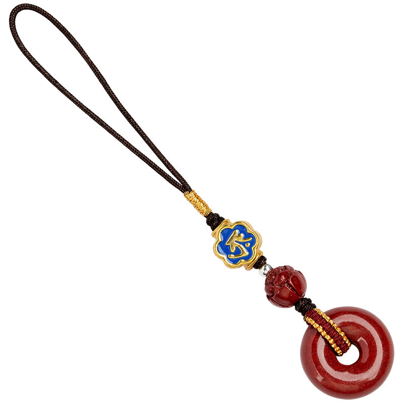 Natural cinnabar zodiac amulet with blue enamel charm product photo on white background