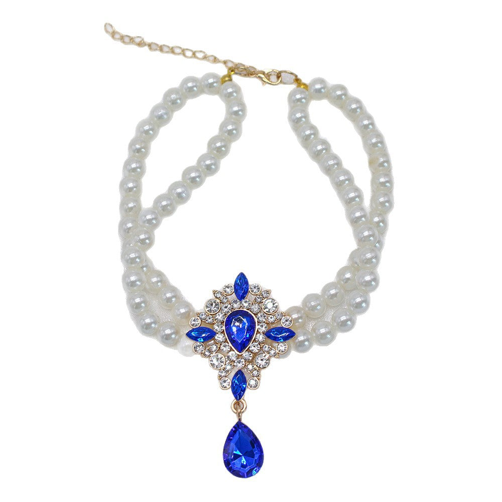 Elegant Pearl Crystal Collar – Blue teardrop crystal double pearl collar isolated on white background