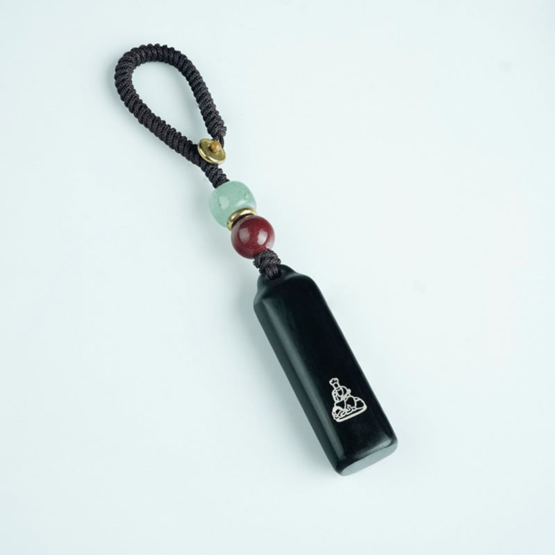 Ebony Eight Guardians talisman keychain with silver inlay for Horse zodiac Buddhist protection