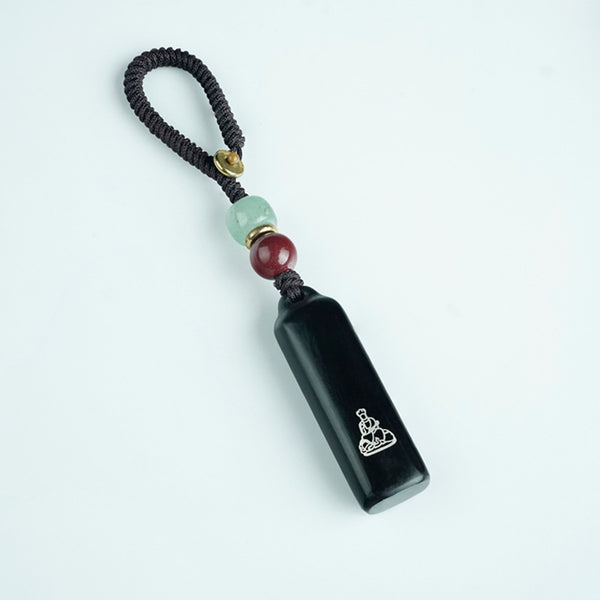 Ebony Eight Guardians talisman keychain with silver inlay for Horse zodiac Buddhist protection