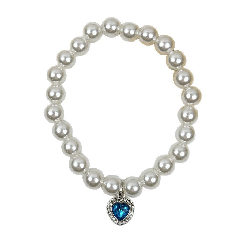 Quartz Heart Pearl Pet Collar – Pearl bead collar with blue heart crystal isolated on white, pet gift