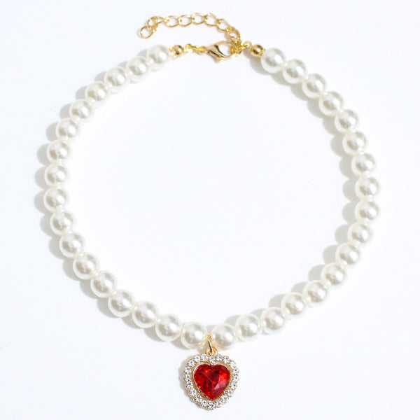 Crystal Heart Pet Necklace – Red heart crystal pearl collar on white background with gold chain clasp