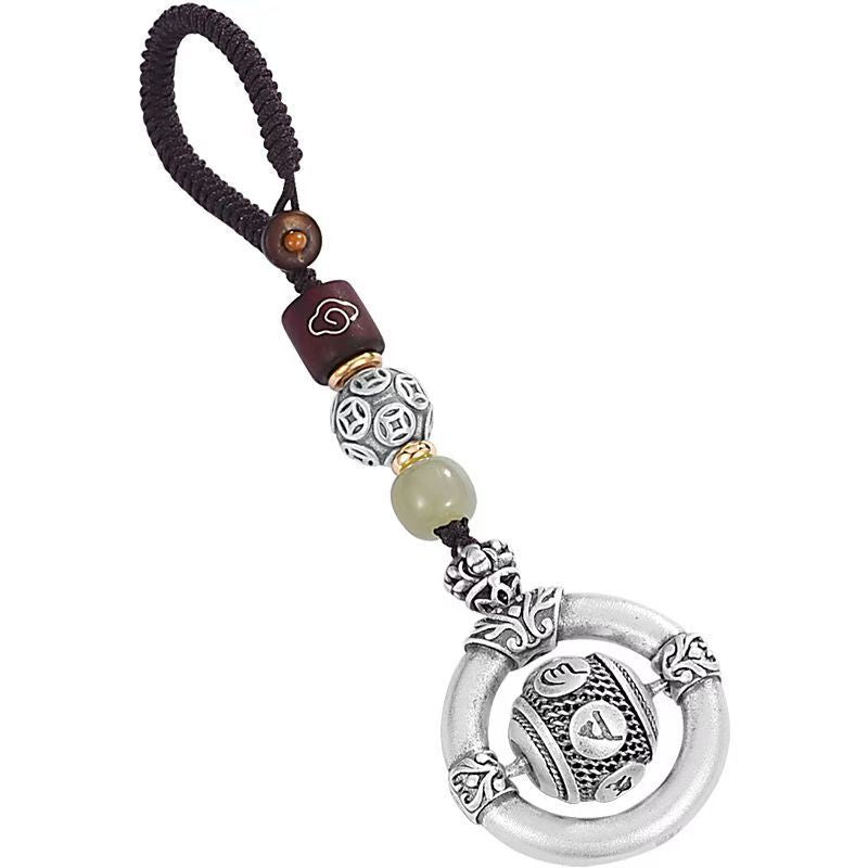 Mantra Keychain – full view of silver mantra ring keychain on white background, braided cord