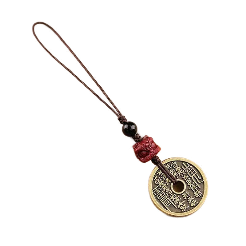 Cinnabar Bagua Mountain Ghost phone charm with red beast bead on white background