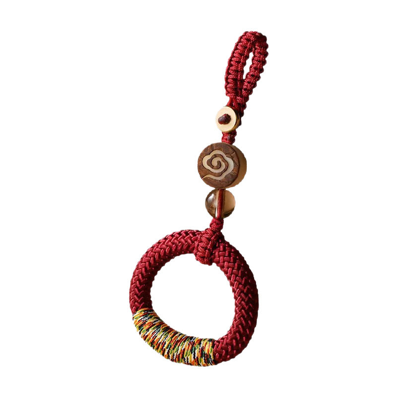 Handwoven Feng Shui Macrame Keychain – Blue, lifestyle shot, lucky charm