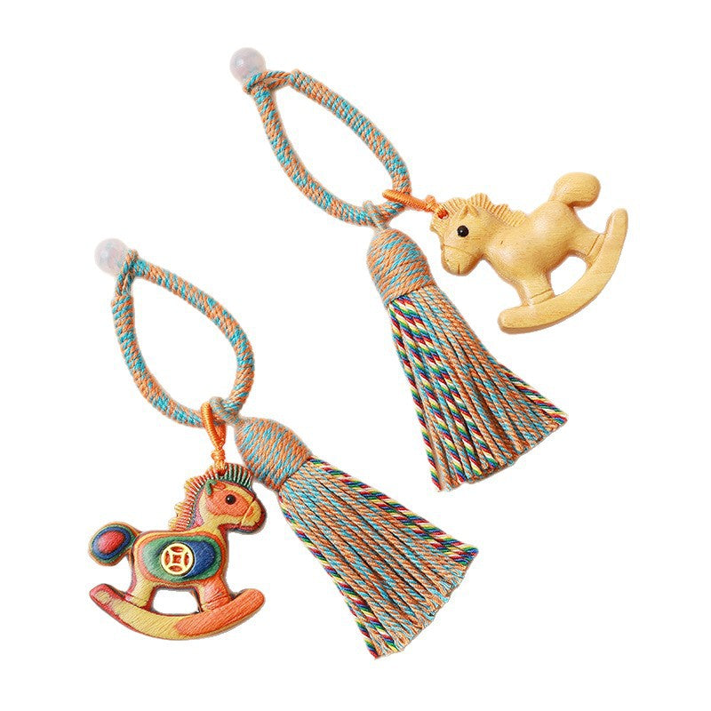 Rainbow Wooden Horse Keychain – natural wood and painted rainbow styles on clean white background