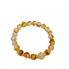 Natural Citrine Bracelet – golden yellow and clear citrine beads with ornate gold spacer beads, laid flat in a circle on pure white background, clean product close-up