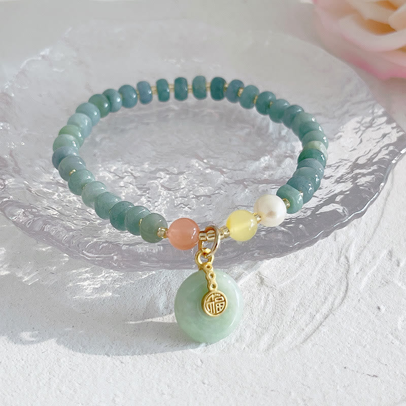 Hetian Jade Pearl Fu Gourd Money Bag Bracelet – Blue jade bracelet with Fu charm on glass plate, prosperity jewelry
