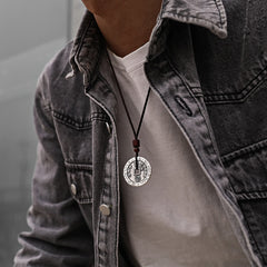 Bagua Yin Yang Obsidian Necklace - silver coin pendant on cord with denim, lifestyle jewelry photo