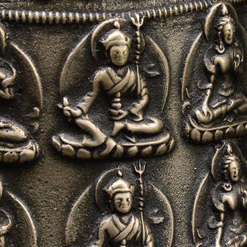 Tibetan Buddha Dragon Bell close-up deity relief panel with trident and lotus throne, antique bronze, protective