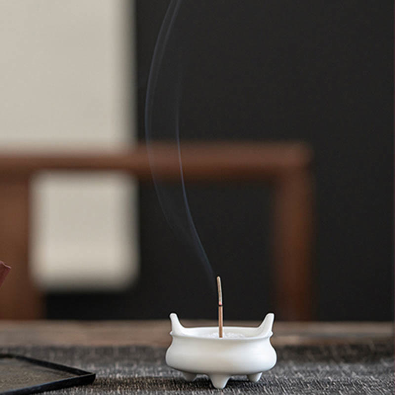 Dragon Ceramic Incense Burner – lion head handle censer with smoke, black background, ornate, protective