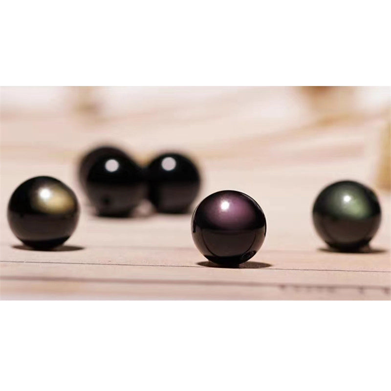 Gold Sheen & Rainbow Obsidian Fu Bracelet – loose iridescent obsidian pearls on wood, healing stones