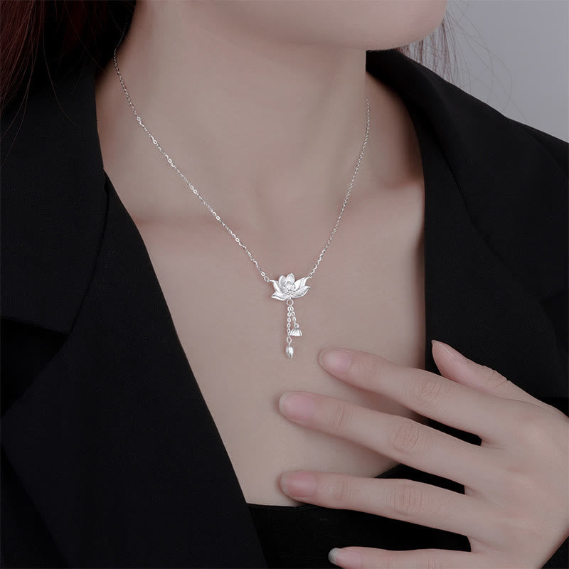 999 Silver Lotus Pod Necklace – Lotus pendant worn on model with black blazer, collarbone-length drape, silver lotus jewelry