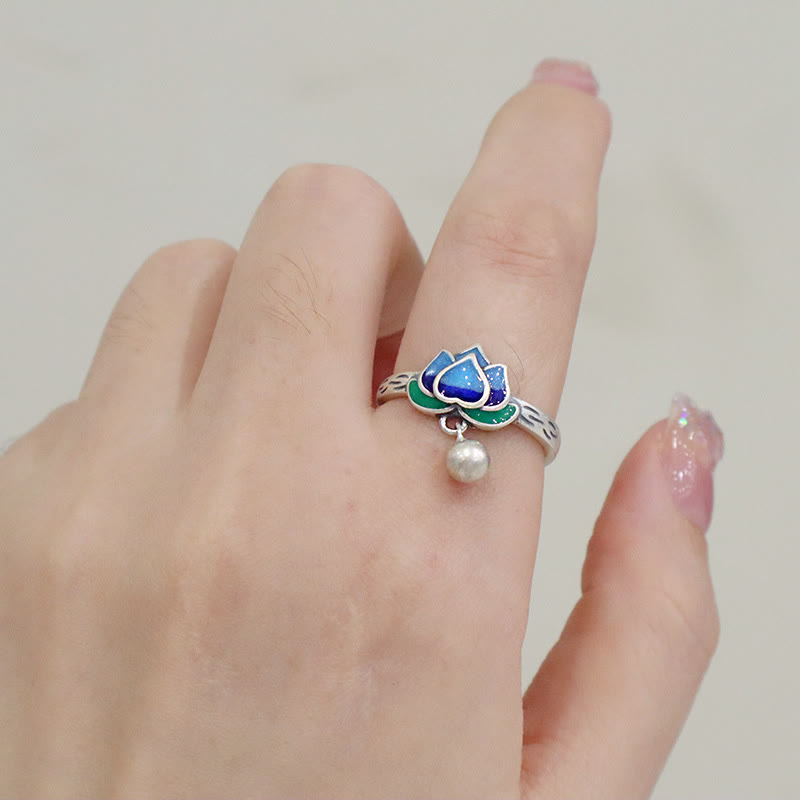 Lotus Flower Copper Ring - adjustable silver lotus with blue enamel petals on hand, meditation