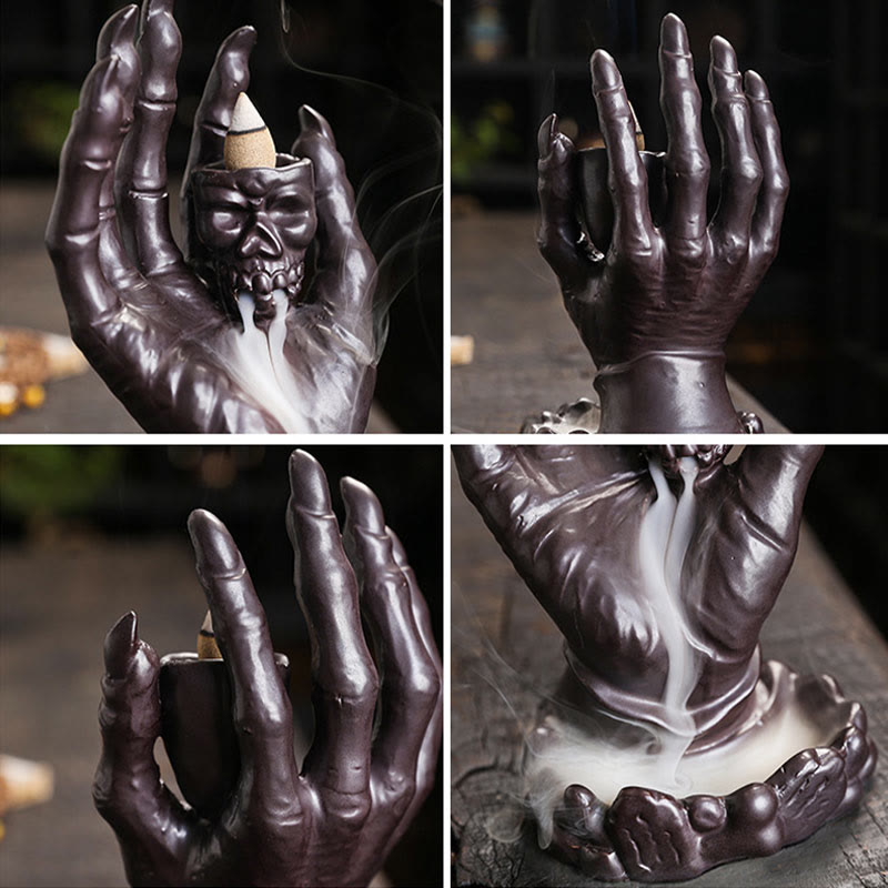Ceramic Ghost Hand Skull Incense Burner – Four-angle view of skull hand design with active smoke cascade, dark stone setting
