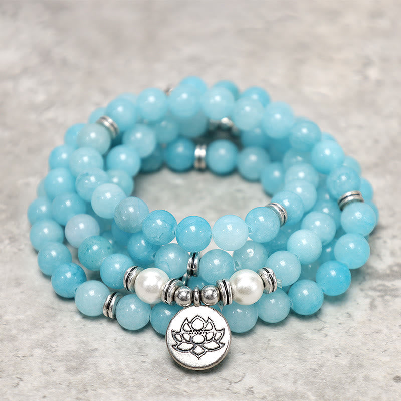 Amazonite Lotus Mala Bracelet angled view showing blue amazonite beads and pearl accents, healing