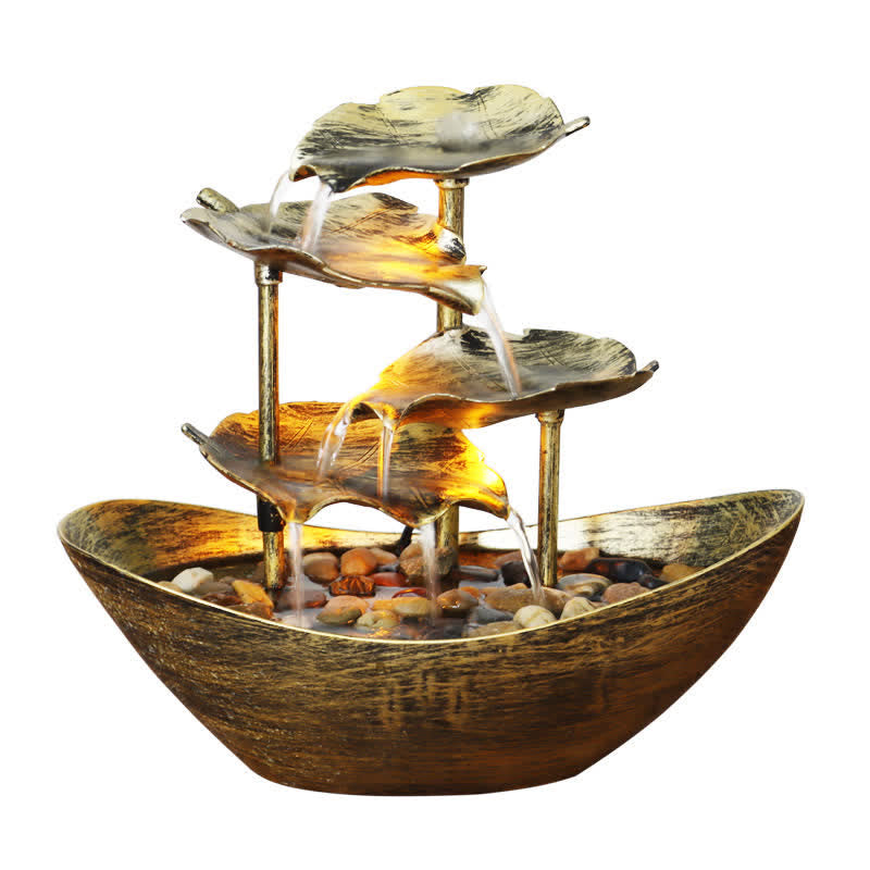 Lotus Leaf LED Waterfall Fountain - lit copper cascade on white table among home decor, zen water feature