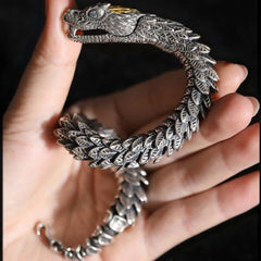 Dragon Snake Copper Bracelet – Open-jaw dragon head with gold accent held on black backdrop, Intimidating