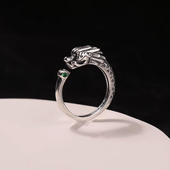 Vintage Dragon Design Ring - Silver dragon head open ring with green gem on white stand, Success