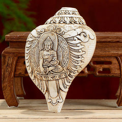 Engraved Shankha Wealth Conch – front carving of Avalokitesvara with wealth vase, Tibetan prosperity shell