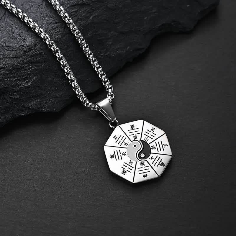 Bagua Yin Yang Titanium Steel Pendant - Polished silver Bagua medallion with trigrams on dark slate, silver pendant Main image