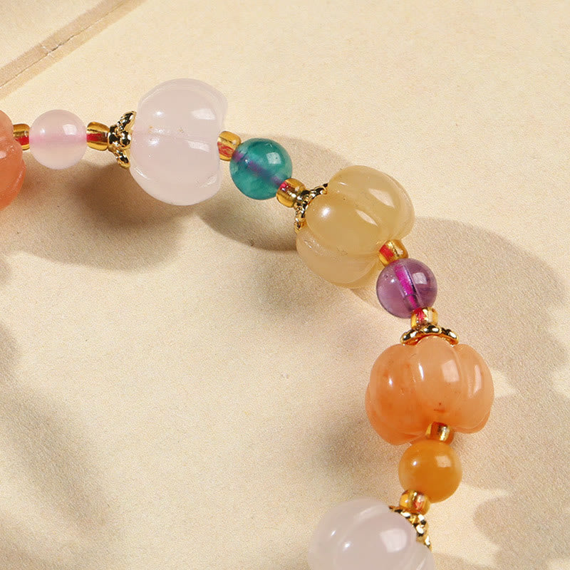 Golden Silk Jade Gourd Bracelet – Detail of white, pink, teal, yellow jade beads