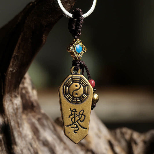 Feng Shui Bagua & Yin Yang Copper Keychain - Aged brass pendant with blue stone and red bead on wood, bagua charm